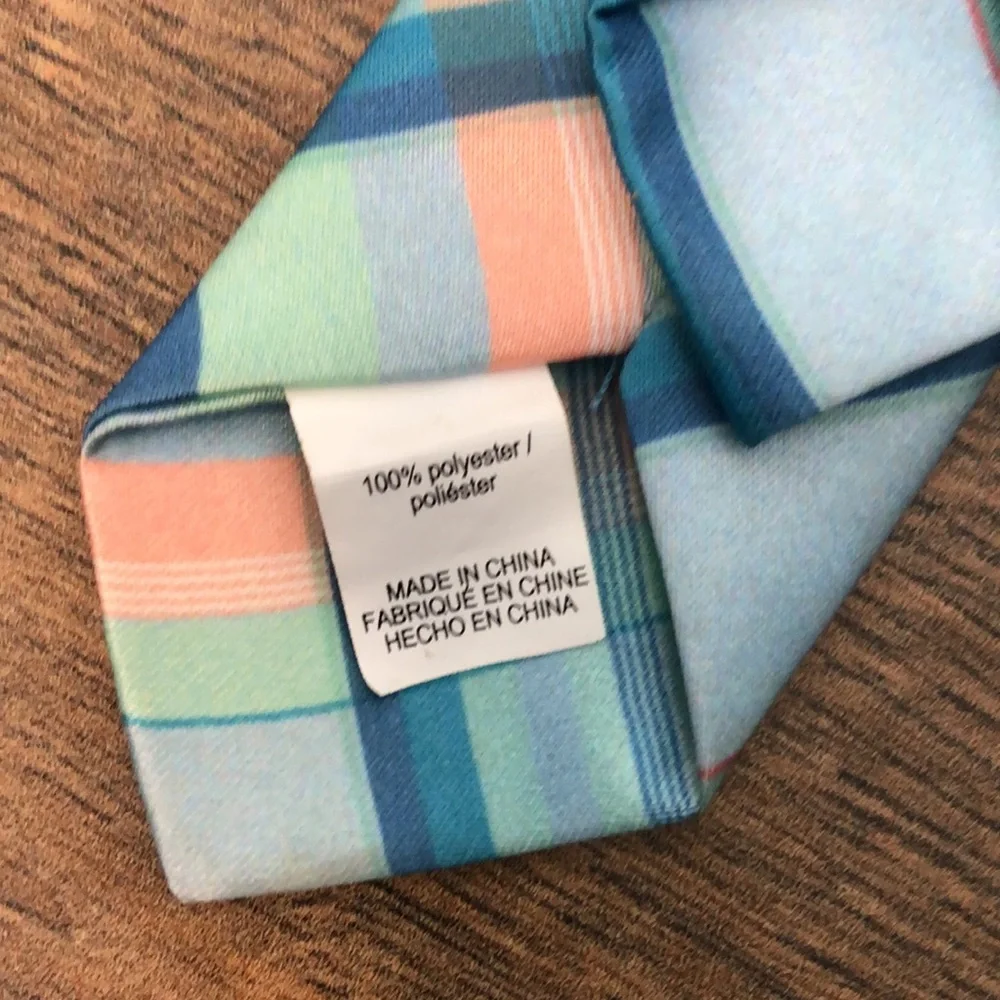 Two toddler ties, one turquoise & blue plaid and the other red & blue plaid